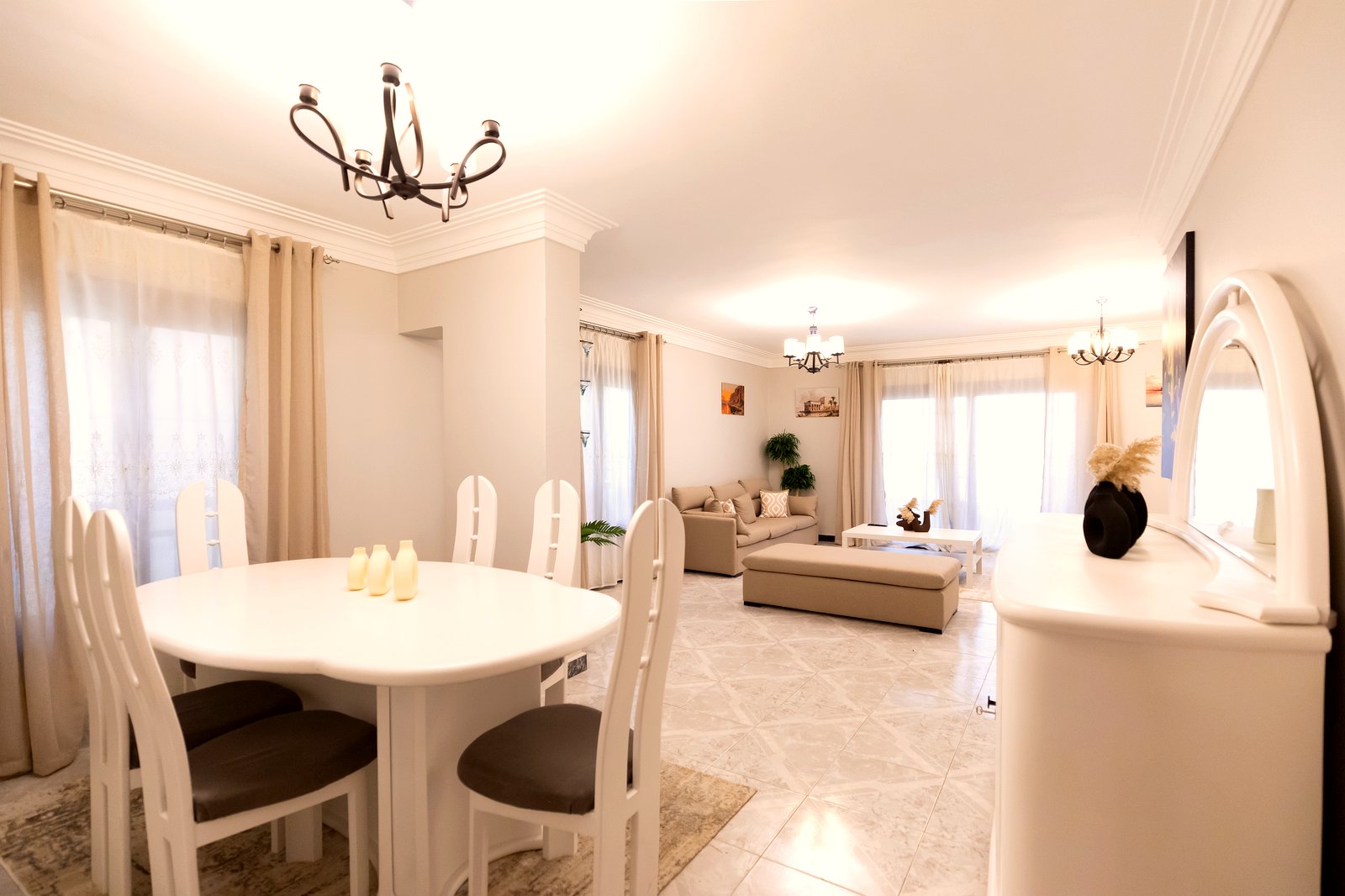Oval dining table set for guests